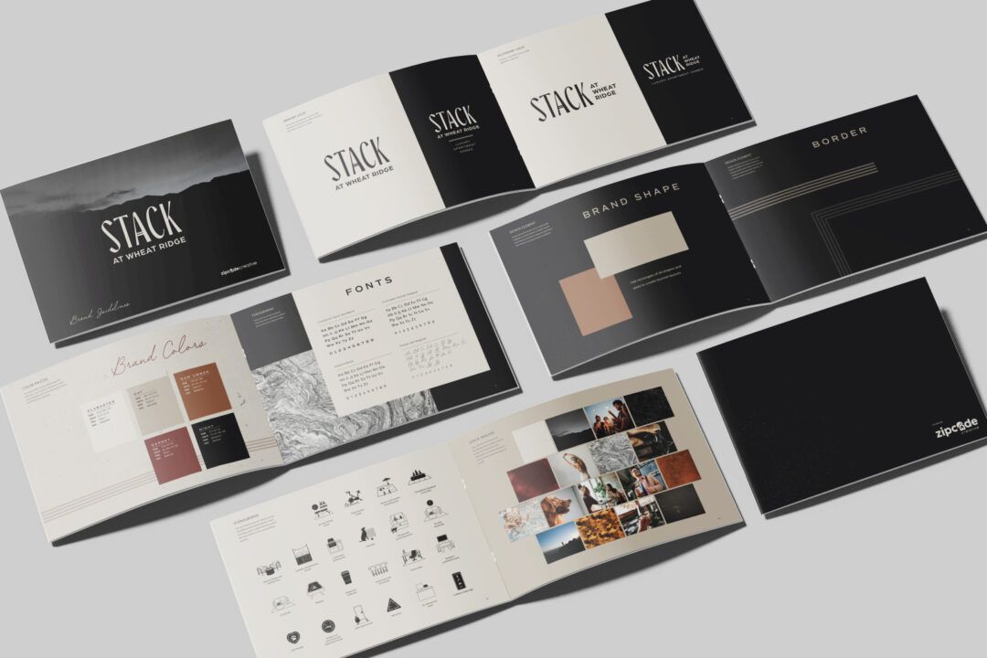 Stack at Wheat Ridge apartment community logo featuring modern typography with industrial design elements