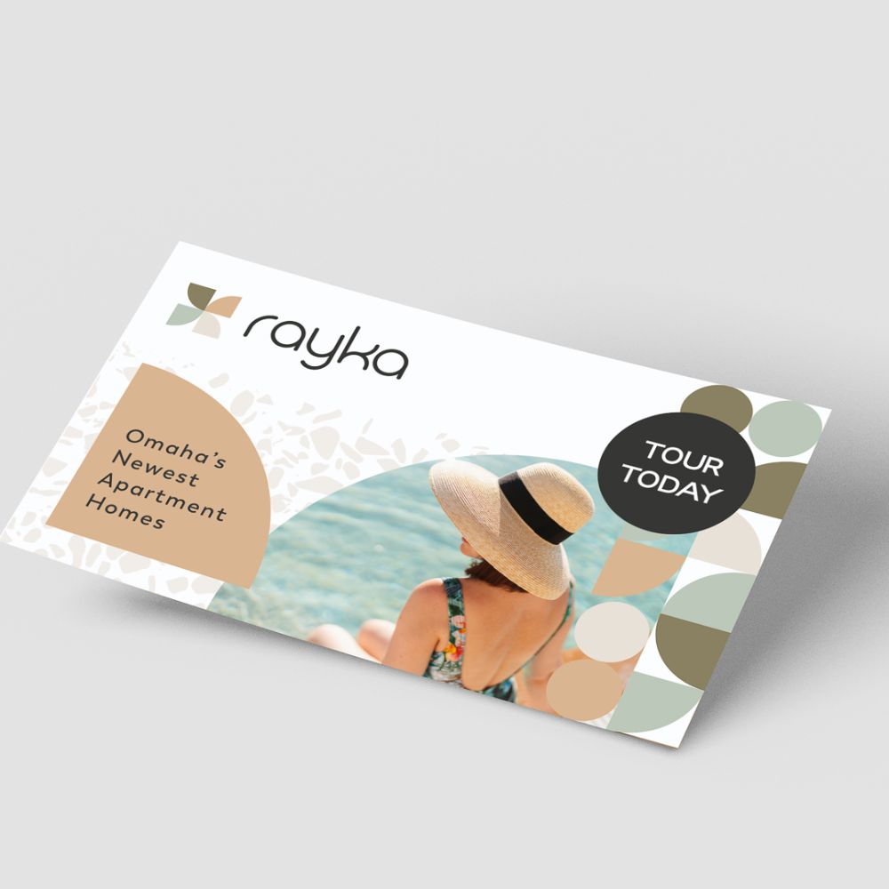 Rayka Omaha apartment postcard mailer with Tour Today call-to-action and lifestyle photography of woman outdoors