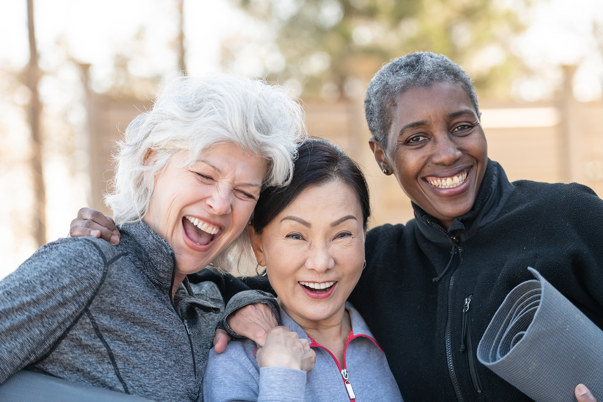 Elderly Friends Posing After Yoga